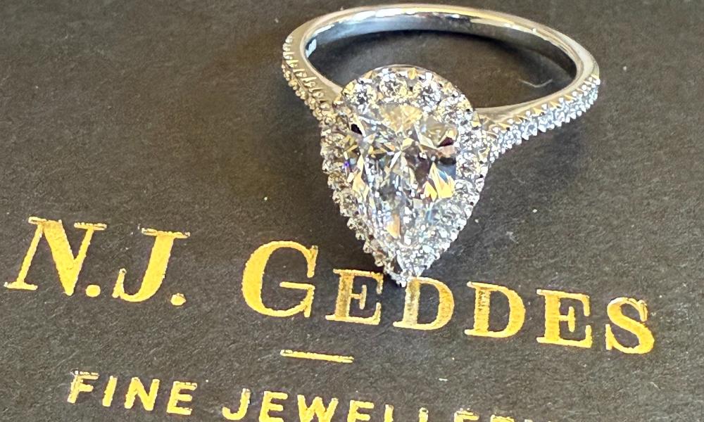 Hand made bespoke 2ct pear shape diamond engagement ring uk