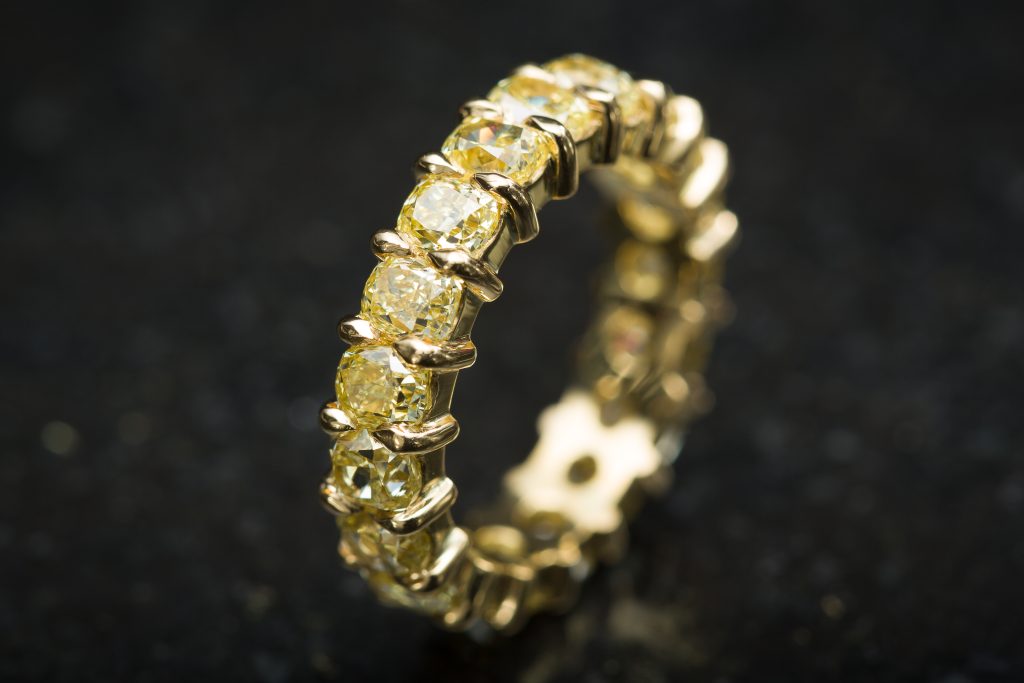Fancy colour yellow diamond full eternity ring. N Geddes