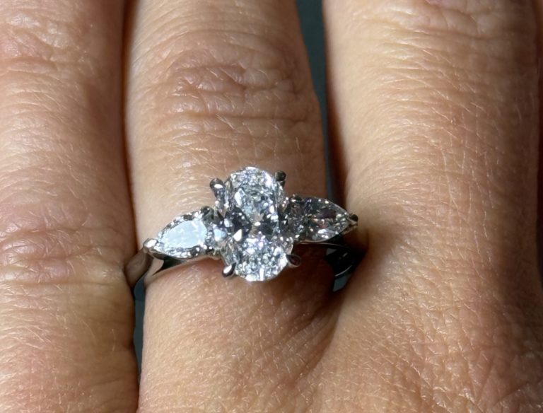 oval and peal shape diamond engagement ring